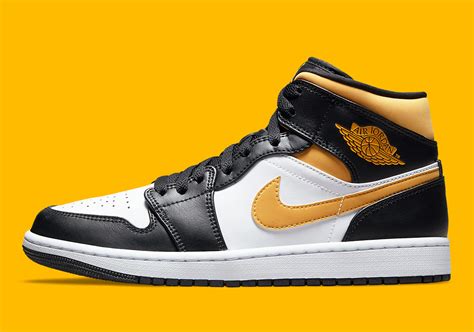 black and gold jordan 1 mids|jordan 1 black university gold.